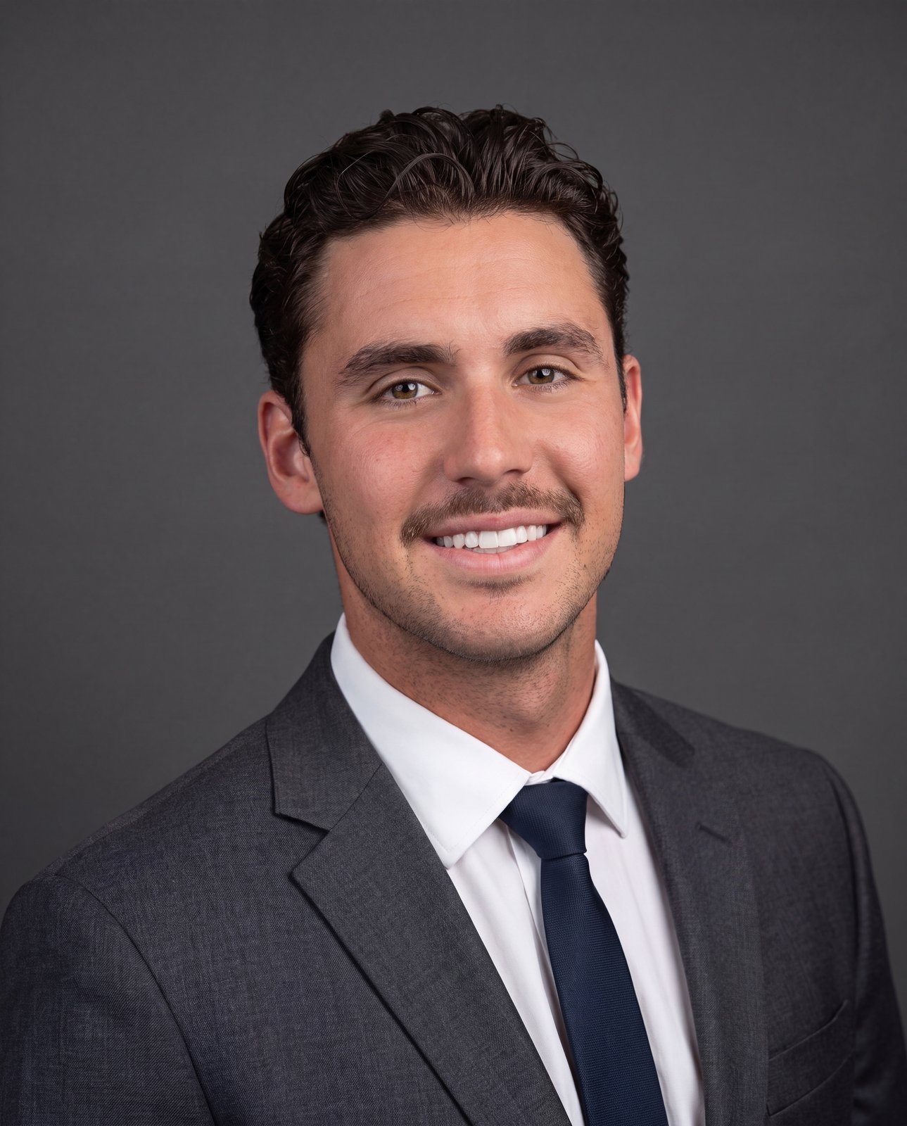 Mark Lusti, Executive Partner & Head of Athlete and NIL Planning at Pienza Wealth Partners